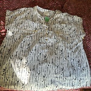 White shirt with black and gold